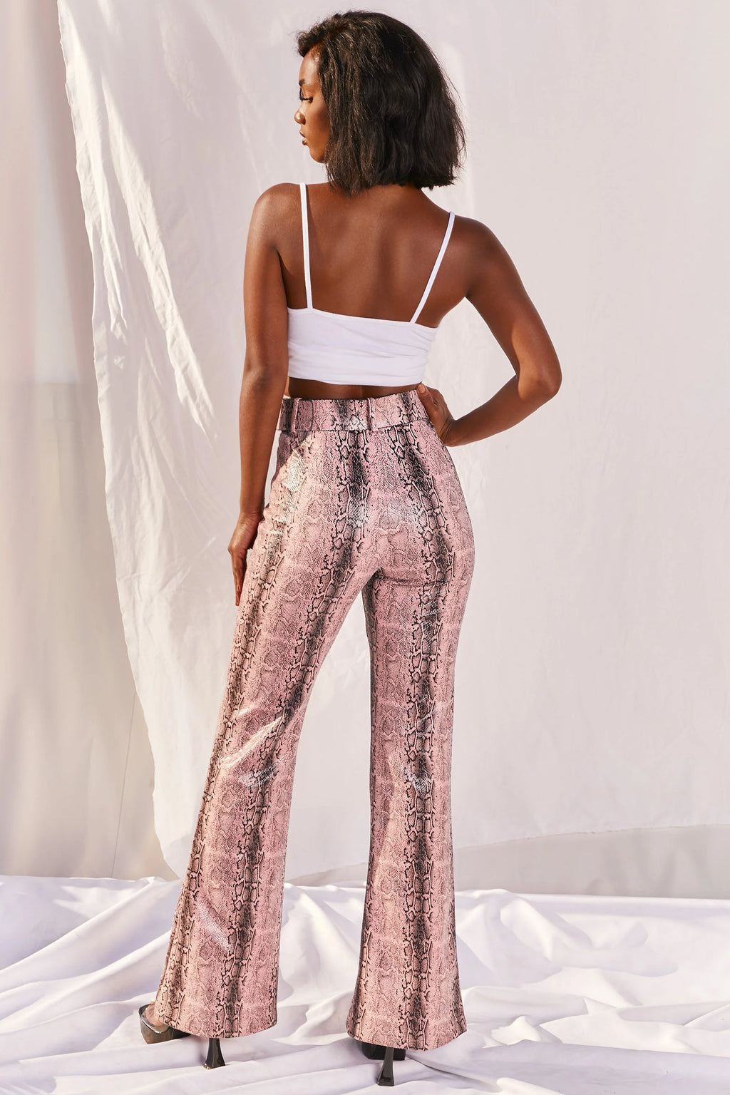Drive ‘Em Wild Petite High Waisted Wide Leg Trousers in Pink Snake Print