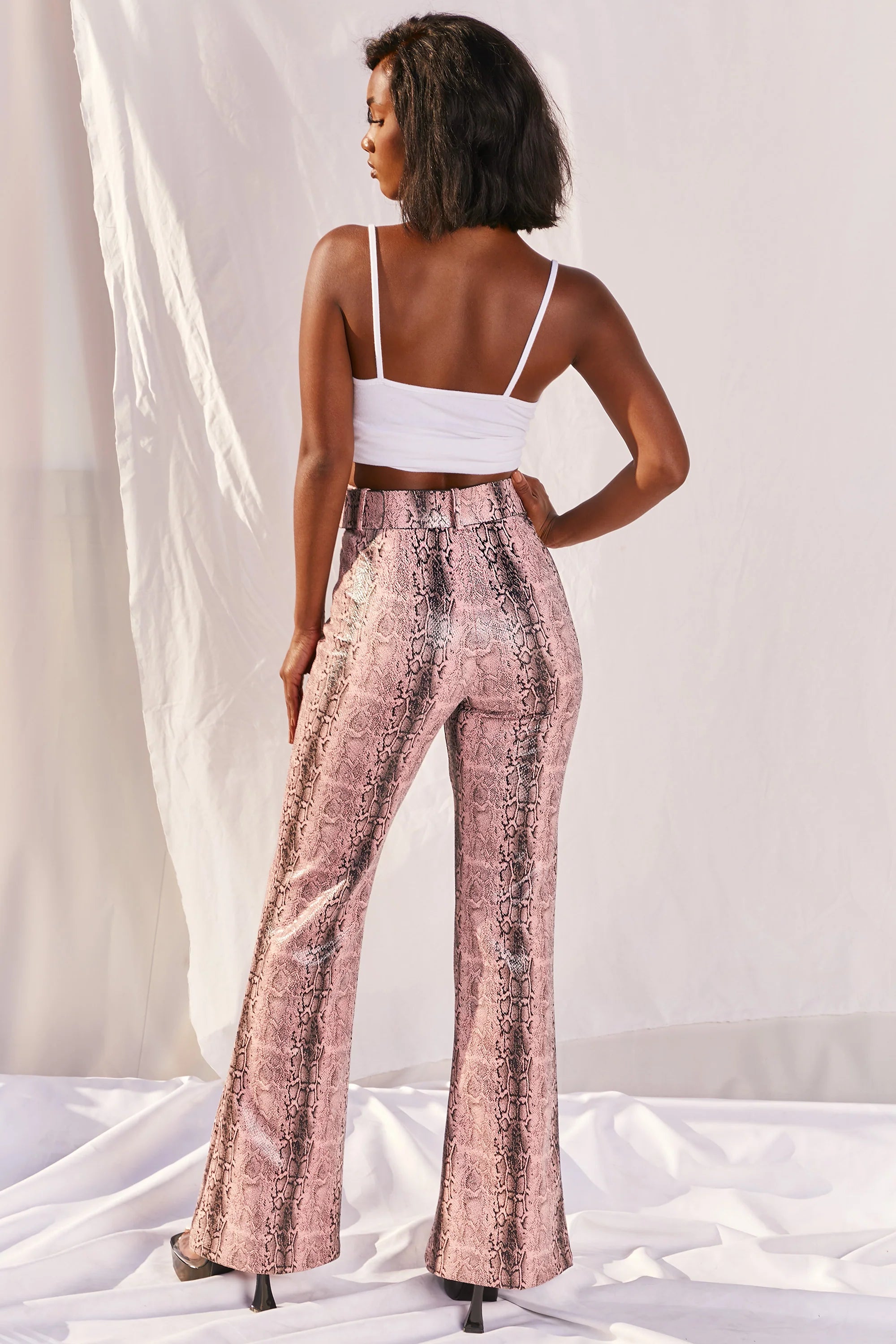 Drive ‘Em Wild Petite High Waisted Wide Leg Trousers in Pink Snake Print