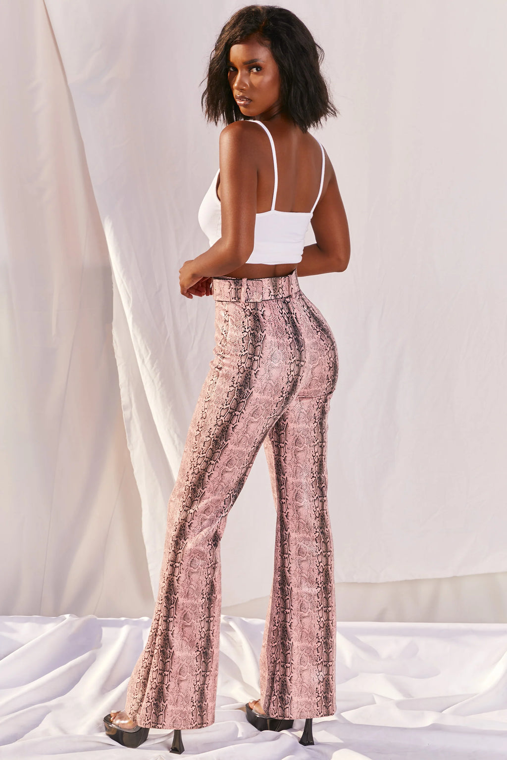 Drive ‘Em Wild Petite High Waisted Wide Leg Trousers in Pink Snake Print