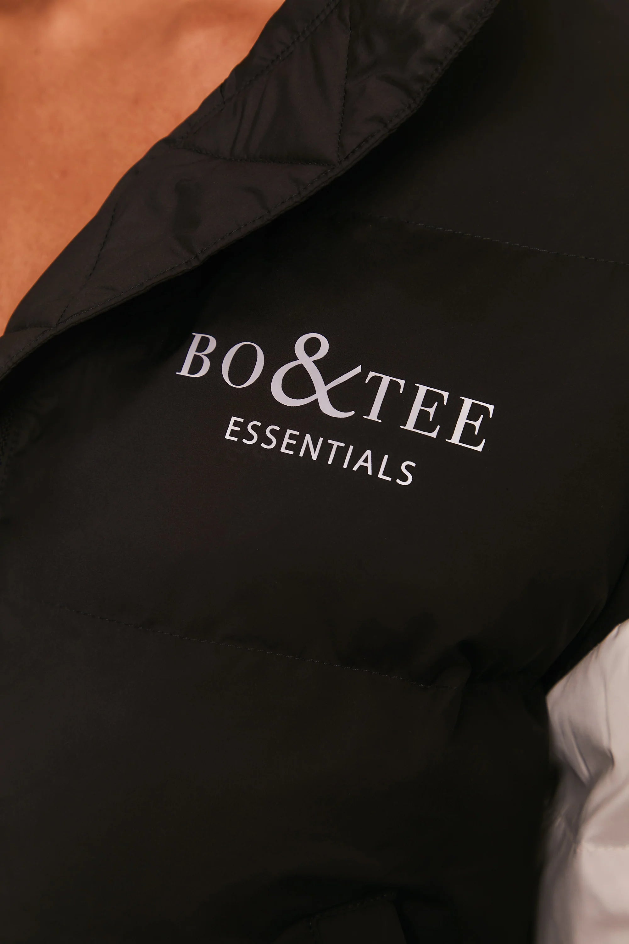 Motivated Contrast Cropped Puffer Jacket in Black & White