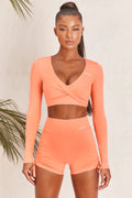 Progress Slinky Long Sleeve Crop Top in Orange