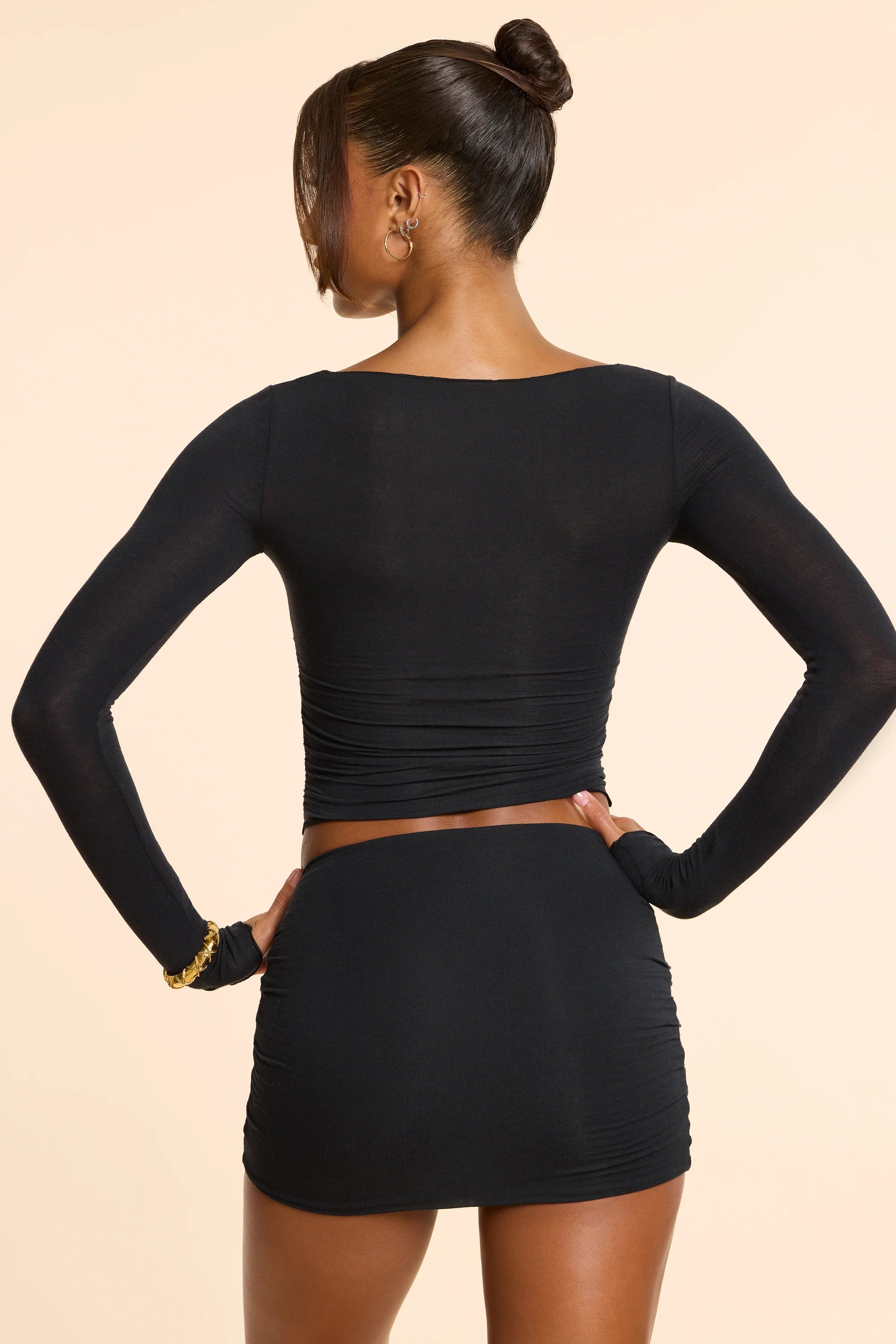 Mid Rise Ruched Modal Cashmere Blend Mini Skirt in Black