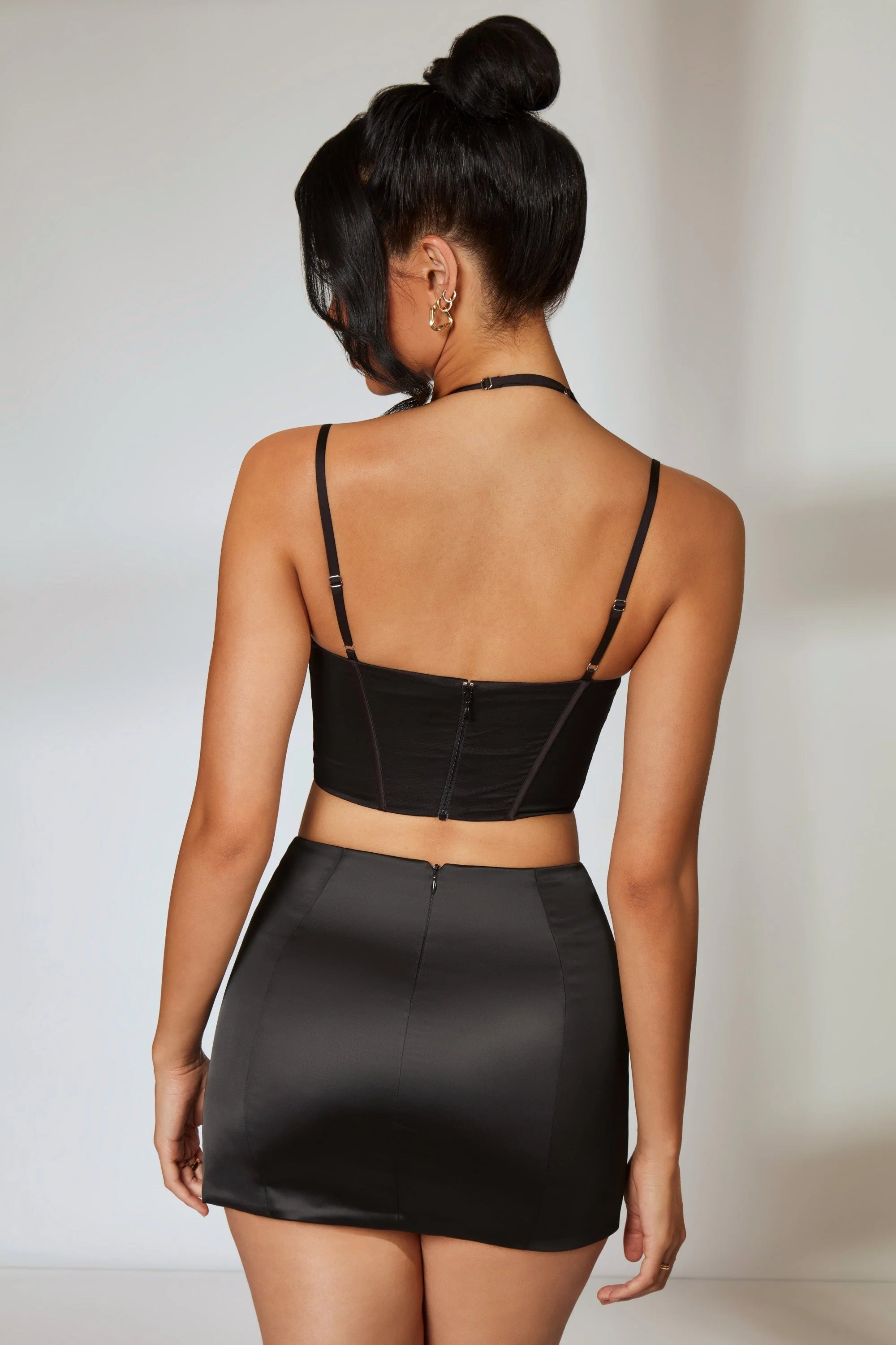 Low Rise Split Hem Mini Skirt in Black