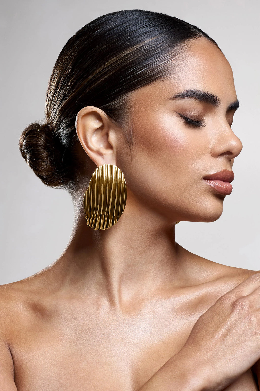 Sarla | Gold Textured Ribbed Statement Oval Earrings