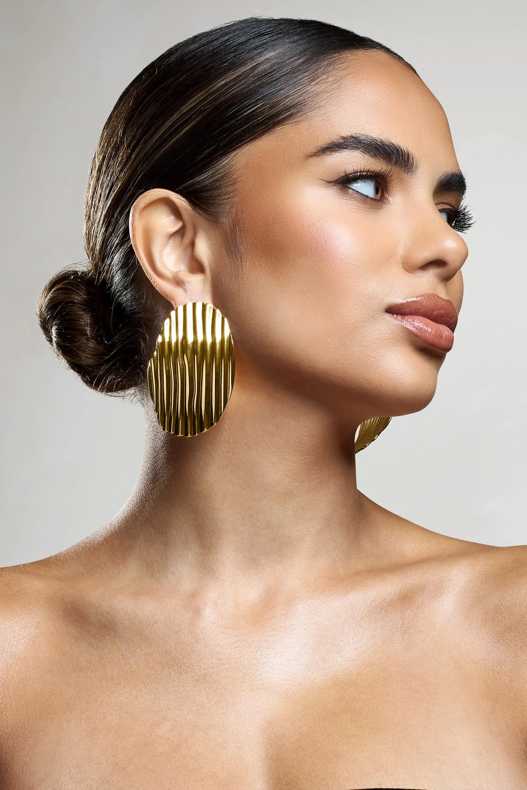 Sarla | Gold Textured Ribbed Statement Oval Earrings