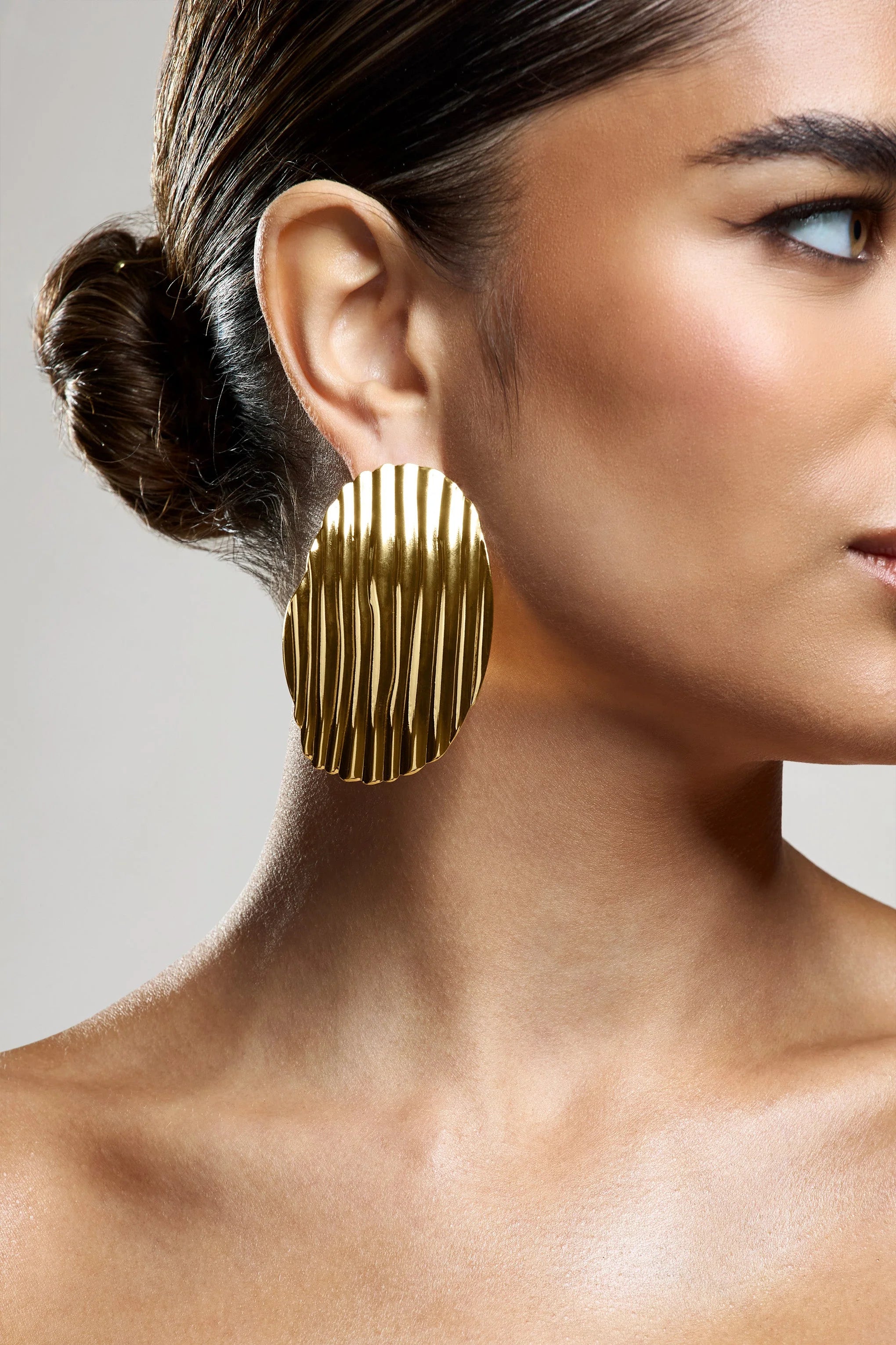 Sarla | Gold Textured Ribbed Statement Oval Earrings